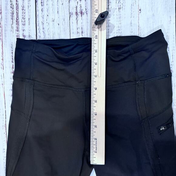 lululemon Black High Rise Crop Leggings Size 4 Zip Pocket 17” Inseam - Picture 6 of 7